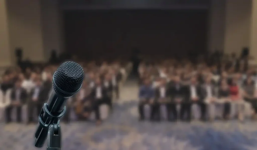 a mic in front of a crowd