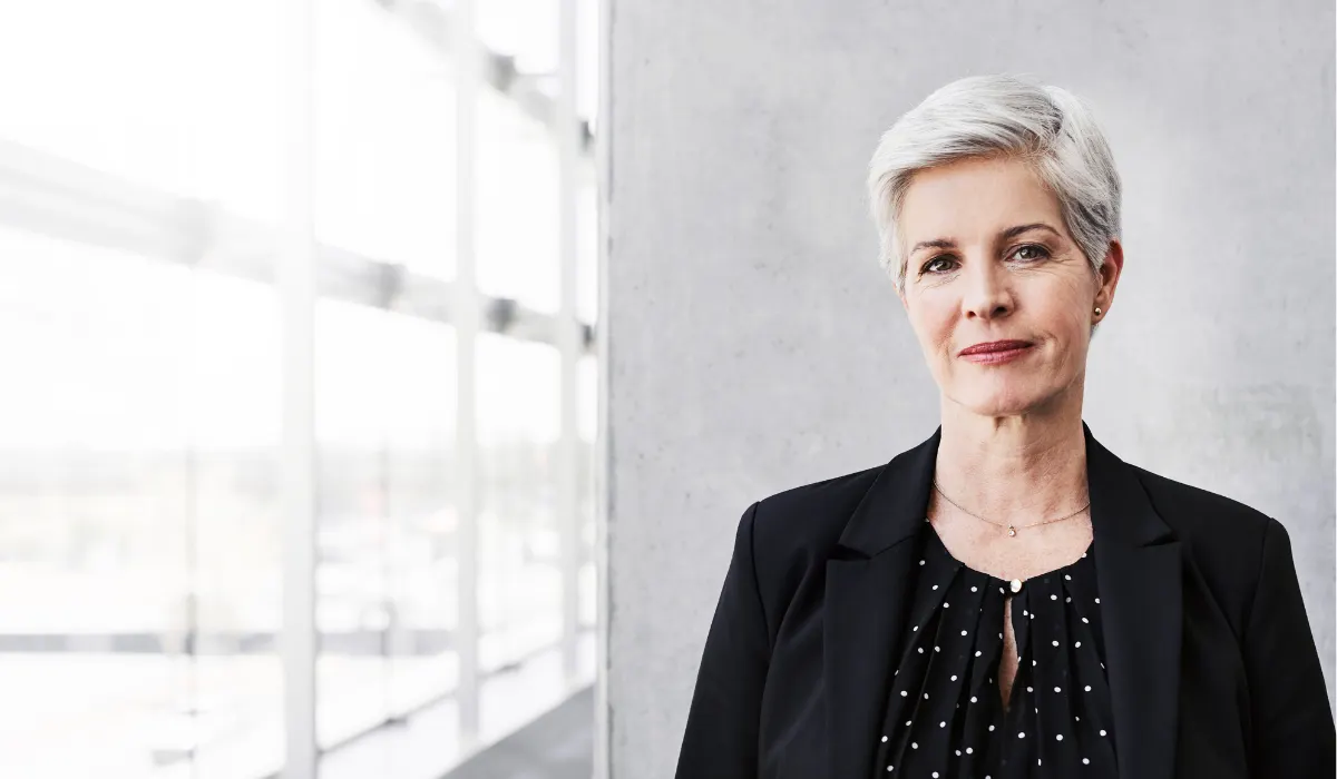 An older person in an office