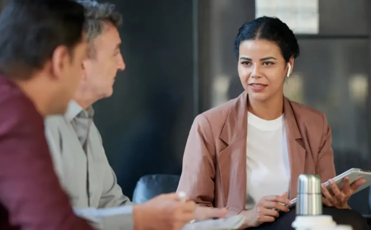A consultant advising top executives in an office.