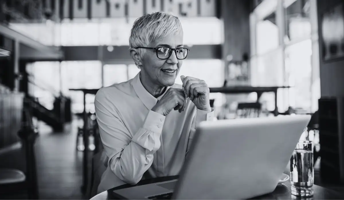 ceo using a laptop on an office desk.